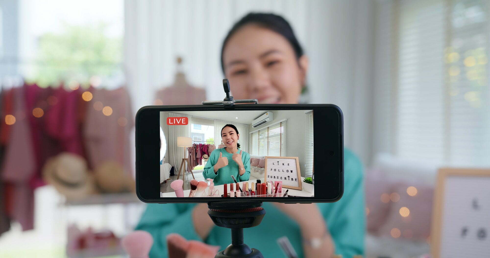 Asia woman micro influencer record live viral video camera at home studio