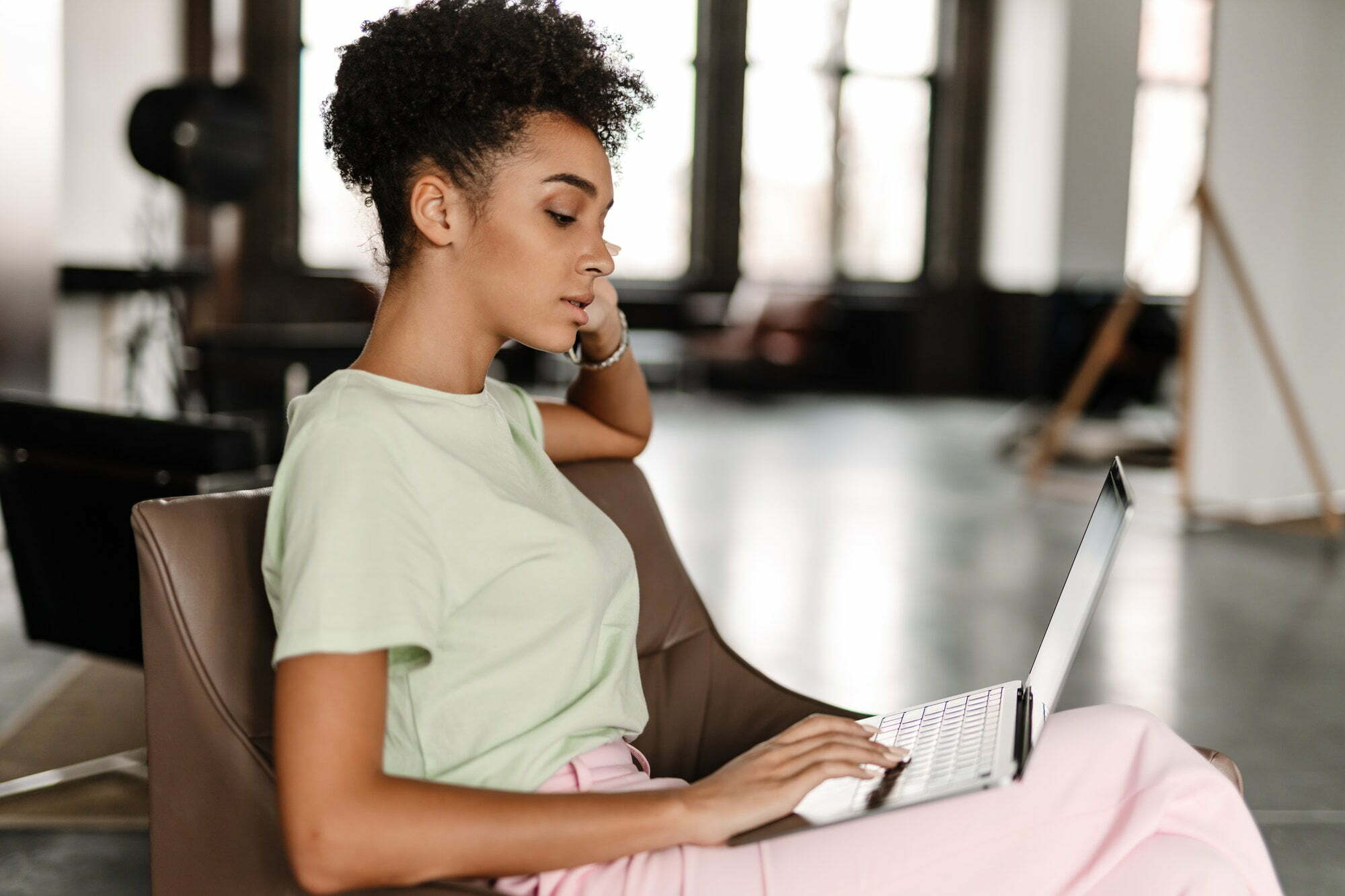 Woman working on her website strategy with Charlene Brown, The Brand Misfit of Bklyn Custom Designs